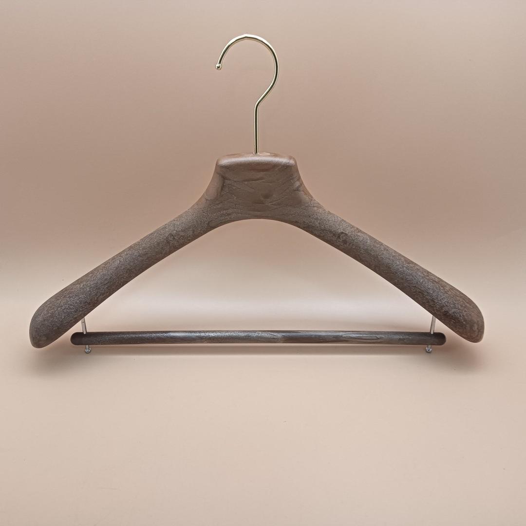 Ttexture of the wood Plastic Clothing Hanger Display With Trouser Bar